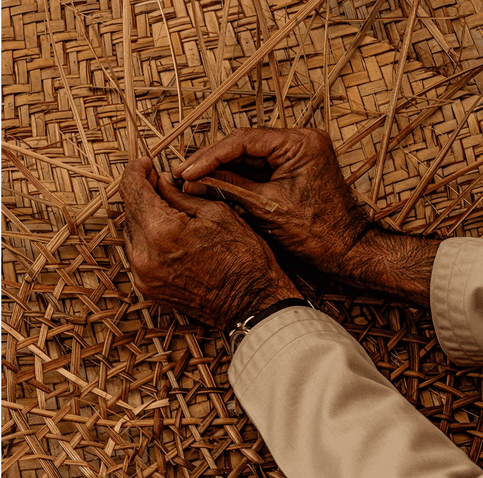 Cebuano craftsman weaving rattan